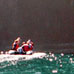 Zodiak approaches Painted Cave Santa Cruz Island