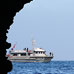 View of RV Shearwater from inside Painted Cave